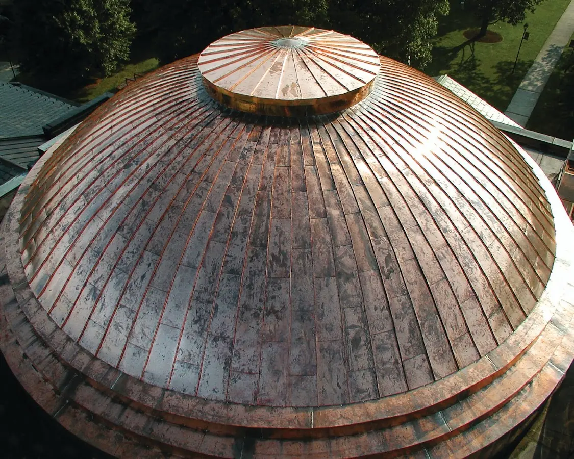 Craftsman Roofing crew installing a new roof in Charlestown